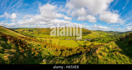 Panoramic view of Chapel Lawn village, Brineddin Wood and Redlake Valley from Caer Caradoc, near Clun, Shropshire, England, UK. Stock Photo