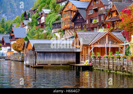 View of traditional old wooden houses up the hill in famous Hallstatt  region of Salzkammergut, Austria Stock Photo