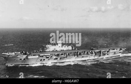 Royal Navy aircraft carrier HMS Eagle (R05) at sea 1951 Stock Photo