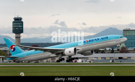 Korean Air Boeing 777 (777-300ER) HL8009 wide-body jetliner taking off from Vancouver International Airport Canada Stock Photo