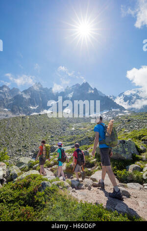 Family hiking on the Grand Balcon Nord, Chamonix Valley, French Alps, France. Stock Photo