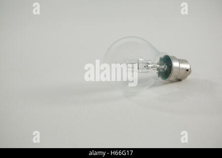 Light bulb against white background Stock Photo