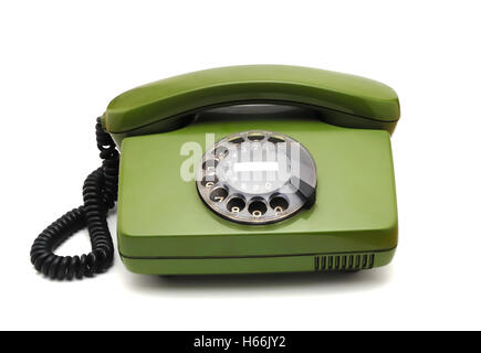 Old analogue disk phone on a white background Stock Photo