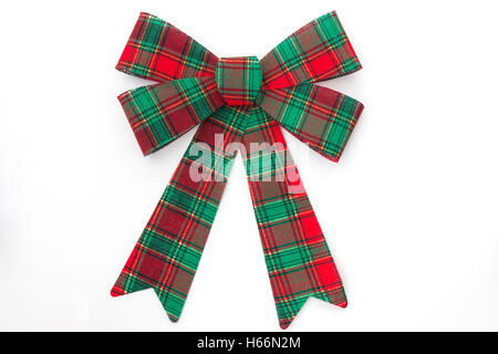 Red and green plaid holiday bow on white background Stock Photo