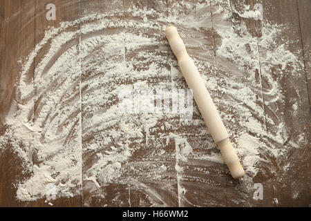 Scattered flour on wooden table. Stock Photo