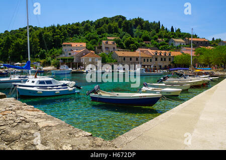 SUDURAD, CROATIA - JUNE 27, 2015: Scene of the fishing port, with boats, locals and tourists, in the village Sudurad, Sipan Isla Stock Photo