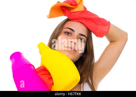 Woman holding duster and detergents Stock Photo