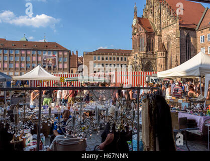 Market in the square in front of the church of our lady, nuremberg . Stock Photo