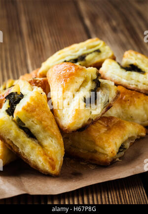 Spinach and cheese puff pastries triangles Stock Photo