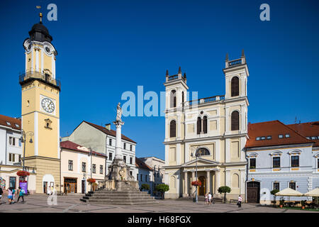 Banska Bystrica, Slovakia - august 07, 2015: Old Main Square, Clock Tower and St. Francis Xavier Cathedral in Banska Bystrica, S Stock Photo