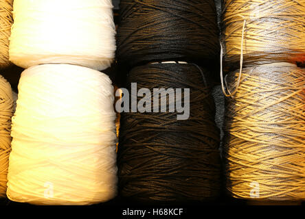 skeins of colored wool threads for sale in the stocked haberdashery Stock Photo