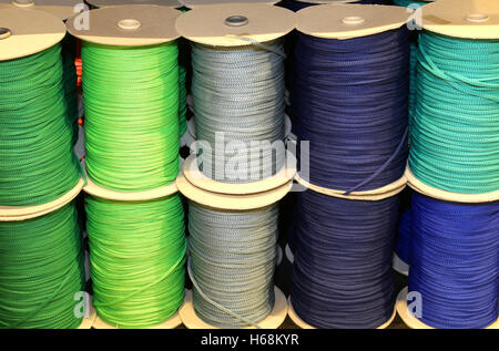 skeins of colored threads of wool and cotton on sale in the stocked haberdashery Stock Photo