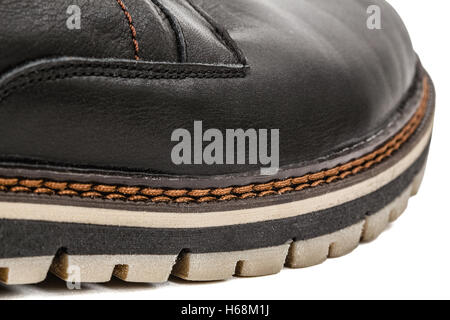 The shoe of needled strong thread, stitch of seam close-up, isolated on white background Stock Photo