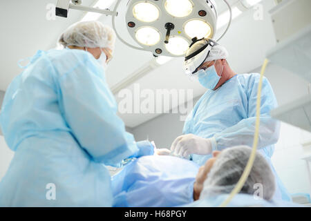 surgeons do surgery patient Stock Photo