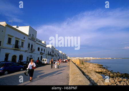 Gallipoli, tourists walking along the Riviera Armando Diaz, old town, Salento, Puglia, Italy Stock Photo