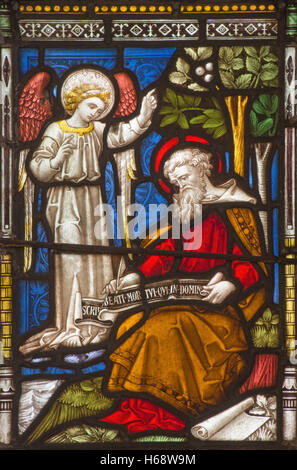 ROME, ITALY - MARCH 9. 2016: The Inspiration of st. John the Apostle on the windowpane of All Saints' Anglican Church Stock Photo