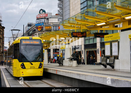 Metrolink tram at Exchange Square tramstop in Manchester. Stock Photo