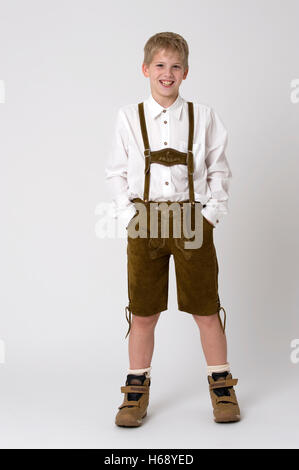 Boy wearing Lederhose, traditional Bavarian leather shorts Stock Photo