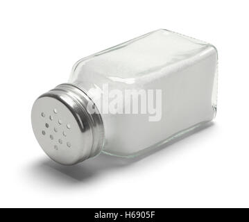 Glass Salt Shaker Tipped Over Isolated on White Background. Stock Photo