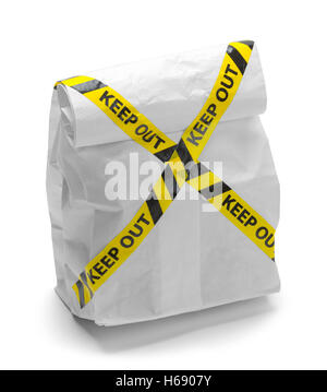 Sack Lunch with Keep Out Tape Isolated on White Background. Stock Photo