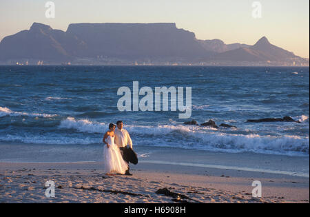 Wedding couple on the beach in Bloubergstrand, view on Table Mountain, Cape Town, Western Cape, South Africa, Africa Stock Photo