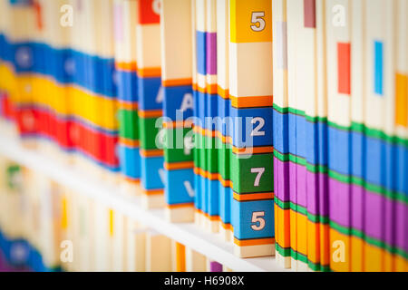 Shelf of Medical Files in Office Setting. Stock Photo
