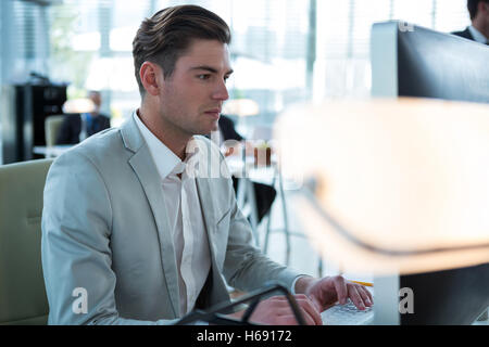 Businessman working on computer Stock Photo