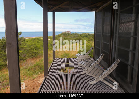 Porch overlooking the ocean at the Hatch Cottage, Wellfleet, Cape Cod, Massachusetts Stock Photo