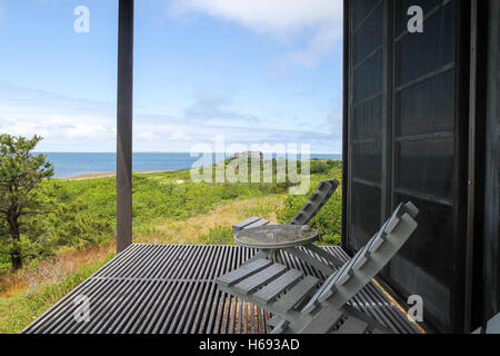 Porch overlooking the ocean at the Hatch Cottage, Wellfleet, Cape Cod, Massachusetts Stock Photo