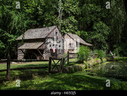 Historic Cuttalossa farm cabin and gristmill cabin in the woods, Bucks County, rural Pennsylvania, USA, US, old country house, historical mill images Stock Photo