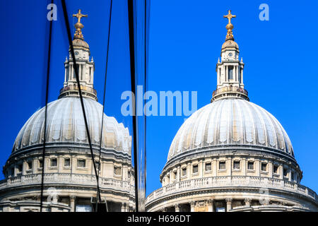 St Pauls Cathedral and its reflection from glass walls of One New Change building in London