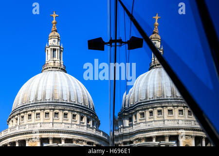 St Pauls Cathedral and its reflection from glass walls of One New Change building in London St Pauls Cathedral and its reflection from glass walls of One New Change building in London