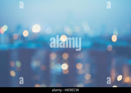 Blurred city lights background, blue color tint Stock Photo