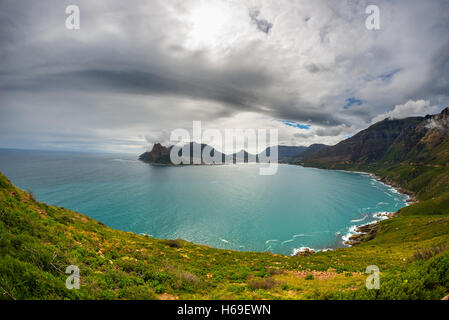 Fisheye ultrawide view of Hout Bay, Cape Town, South Africa, from Chapman's Peak. Winter season, cloudy and dramatic sky. Stock Photo