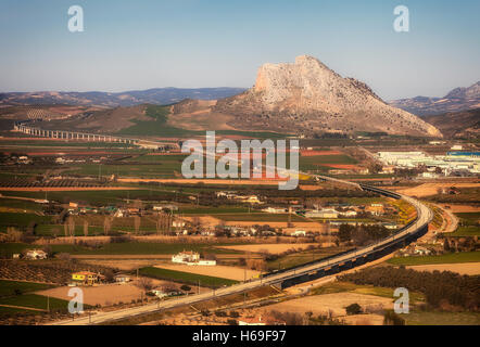 Roads around Antequera with 880 metre Peña de los Enamorados ('The Lovers' Rock') mountain in the background.Antequera, Malaga Province, Spain Stock Photo