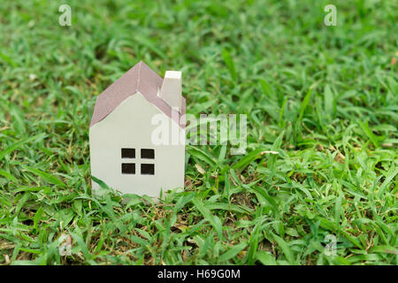 a house model on green grass Stock Photo