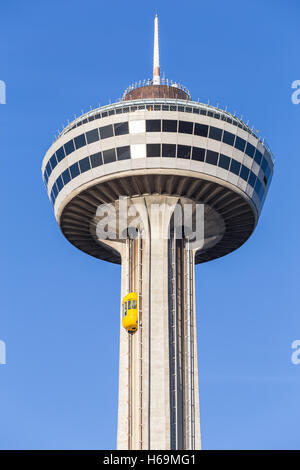 An outside elevator carries tourists to the observation deck of Skylon Tower in Niagara Falls, Ontario, Canada. Stock Photo