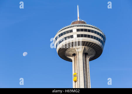 An outside elevator carries tourists to the observation deck of Skylon Tower in Niagara Falls, Ontario, Canada. Stock Photo