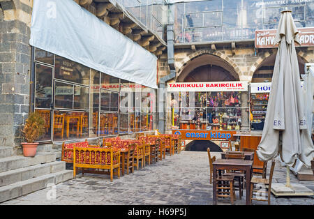 The cozy outdoor cafe located in the courtyard of the former Hasan Pasha Inn, that serves as the tourist market Stock Photo