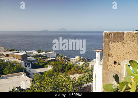 Ginostra, Aeolian islands/Italy – September 19th, 2016. typical aeolian house, Vulcano and Lipari on background Stock Photo