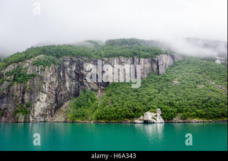 Fjord rocks with vertical cliffs and amazing beautiful water. Stock Photo