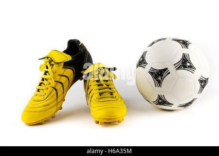 over-white portrait of a pair of football shoes Stock Photo