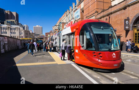 A Sydney Light Rail train outside Paddy's Markets in Sydney Stock Photo