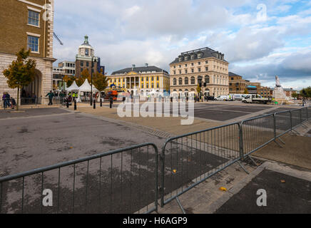 Poundbury, Dorset, UK. 26th Oct, 2016. UK Weather. Queen Mother square in Poundbury in Dorset being readied for the visit of The Queen tomorrow (Thursday 27th) for the unveiling of the statue of the Queen Mother. Also in attendance for the unveiling will be The Duke of Edinburgh, Prince Charles and Camilla. Pictured are the Buckingham Palace replica called Strathmore House and The Duchess of Cornwall Inn. Picture Credit:  Graham Hunt/Alamy Live News Stock Photo
