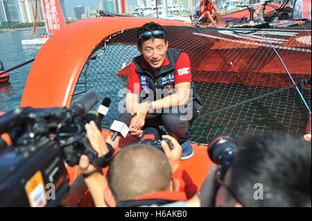 Qingdao, Qingdao, China. 27th Sep, 2015. Qingdao, CHINA-September 27 2015: (EDITORIAL USE ONLY. CHINA OUT) .Chinese mariner Guo Chuan celebrates his success of sailing non-stop through the Arctic Ocean Northeast passage from Murmansk to Bering Straits at Olympic Sailing Center in Qingdao, east China's Shandong Province, September 27th, 2015.Guo Chuan, the first Chinese who finished non-stop global saling, was reported missing on his solo trans-Pacific voyage in United States on October 26th, 2016. Watchstanders at the US Coast Guard Joint Rescue Coordination Center Honolulu, Hawaii, rec Stock Photo