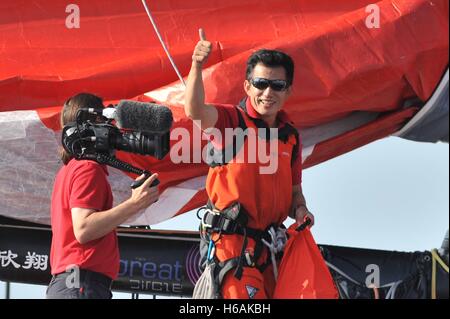 Qingdao, Qingdao, China. 27th Sep, 2015. Qingdao, CHINA-September 27 2015: (EDITORIAL USE ONLY. CHINA OUT) .Chinese mariner Guo Chuan celebrates his success of sailing non-stop through the Arctic Ocean Northeast passage from Murmansk to Bering Straits at Olympic Sailing Center in Qingdao, east China's Shandong Province, September 27th, 2015.Guo Chuan, the first Chinese who finished non-stop global saling, was reported missing on his solo trans-Pacific voyage in United States on October 26th, 2016. Watchstanders at the US Coast Guard Joint Rescue Coordination Center Honolulu, Hawaii, rec Stock Photo