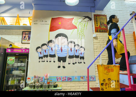 Nanjing, Nanjing, China. 25th Oct, 2016. Nanjing, CHINA-October 25 2016: (EDITORIAL USE ONLY. CHINA OUT) A classroom-themed restaurant on Zhujiang Road in Nanjing, capital of east China's Jiangsu Province, October 25th, 2016. The restaurant is decorated in the nostalgic style of classroom in 1980s, reminding people born in 1980s of their schooldays. With blackboards, desk-like dining tables as well as childhood video games, the themed restaurant attracts lots of young customers. © SIPA Asia/ZUMA Wire/Alamy Live News Stock Photo