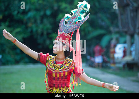 Toraja traditional dancer with colourful traditional costume. The dance called Sanda Oni Stock Photo