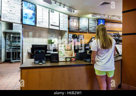 Florida,South,Port St. Saint Lucie,Panera Bread,interior inside,restaurant restaurants food dining eating out cafe cafes bistro,counter,customer,worki Stock Photo