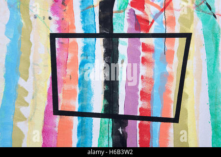 Obtuse black outline rectangle over green, yellow, orange, blue and red dripping wet striped painting Stock Photo